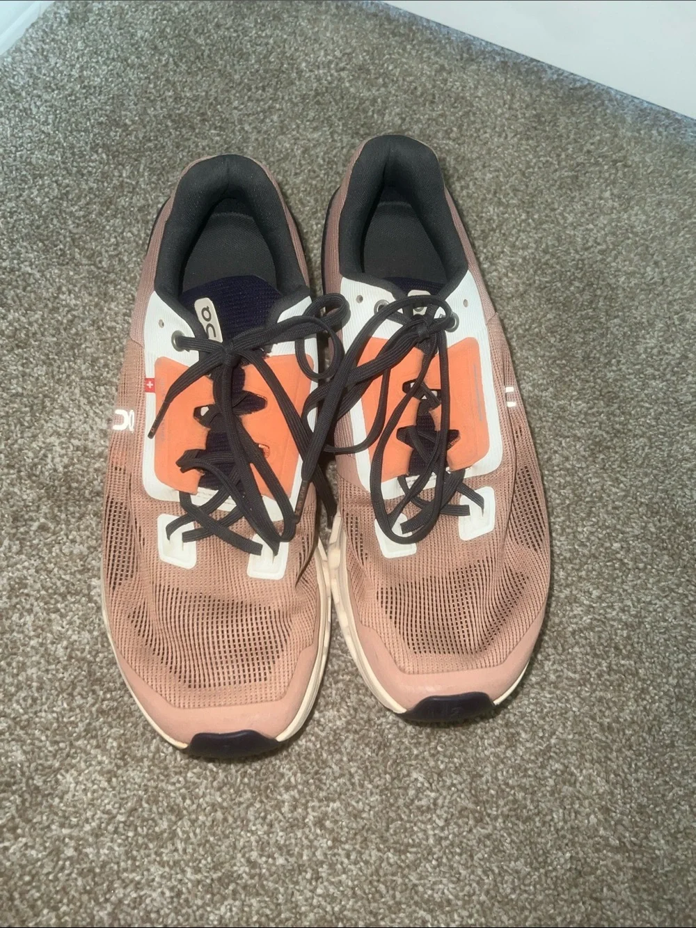 Rose colored OnClouds with orange, navy blue, and white accents. - Picture 2 of 5